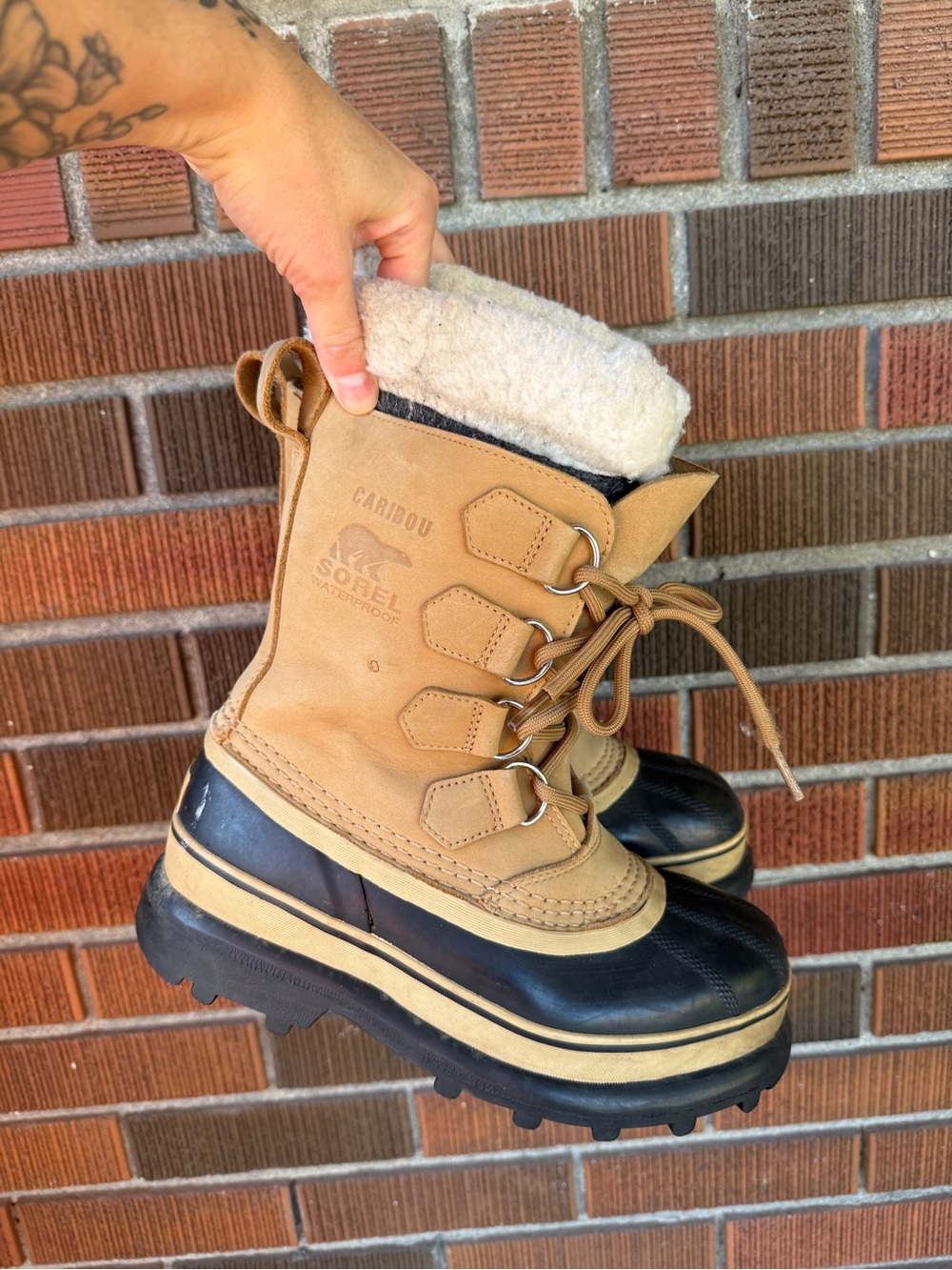 Sorel Women’s Tan and Black Caribou Winter Boots